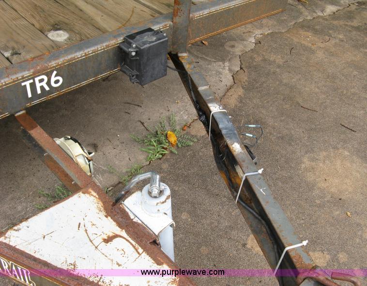 image for item 5063 2003 Load Trail tandem axle flat bed trailer