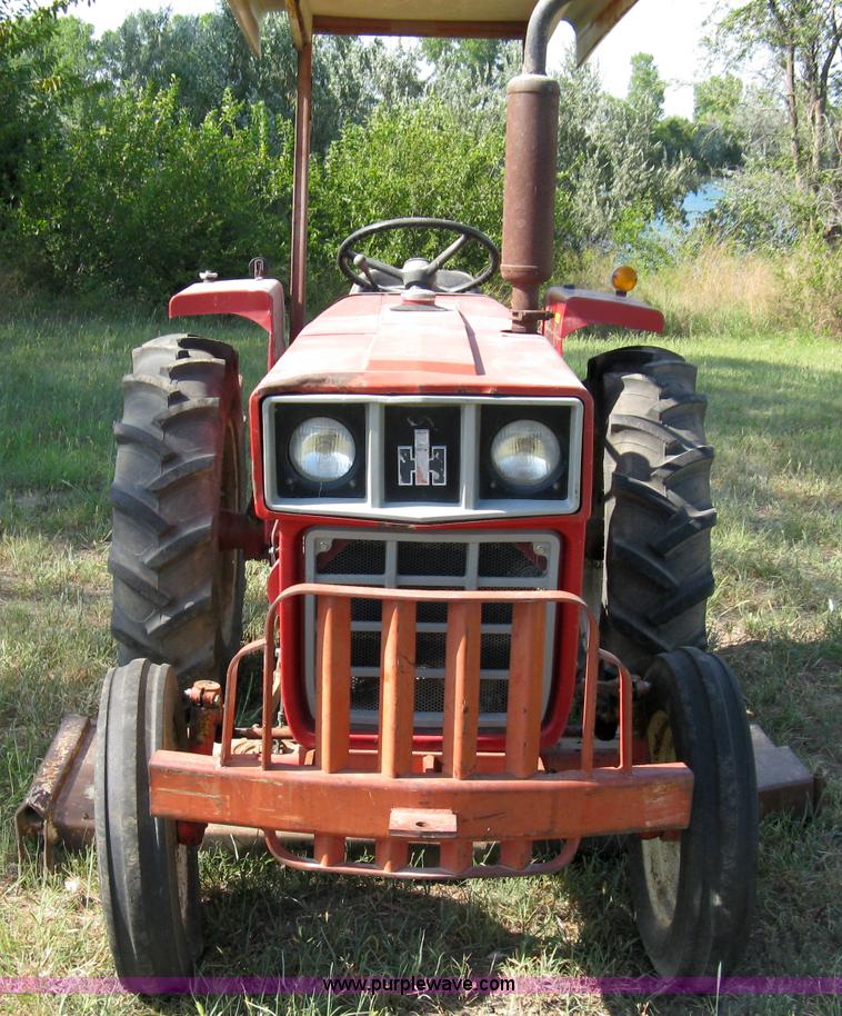 image for item 5065 International 284 tractor with 72" belly mower