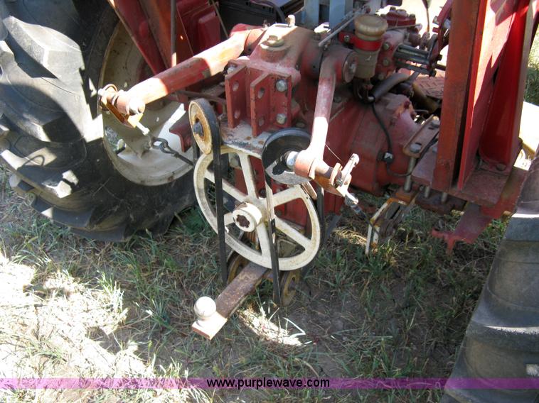 image for item 5065 International 284 tractor with 72" belly mower