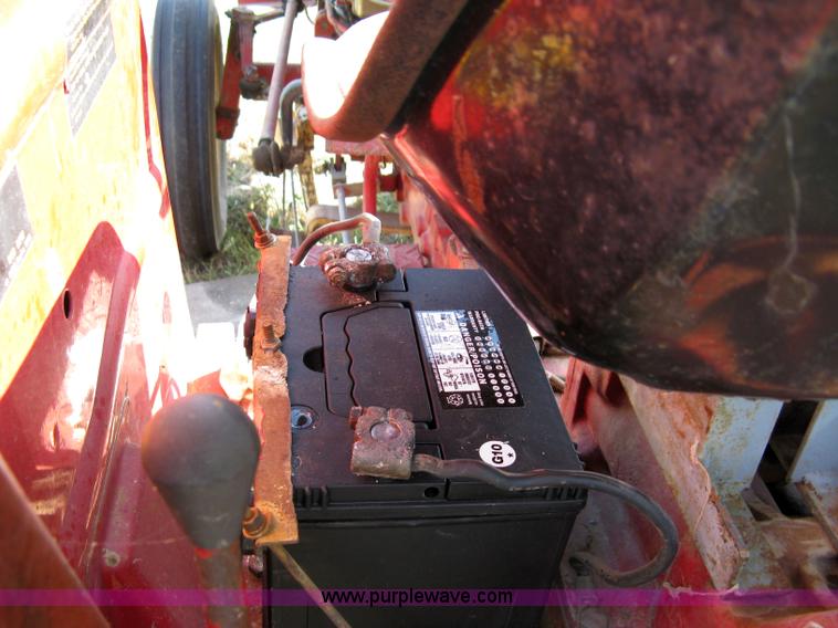 image for item 5065 International 284 tractor with 72" belly mower