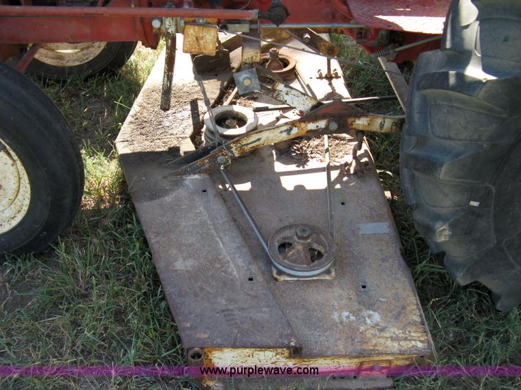 image for item 5065 International 284 tractor with 72" belly mower