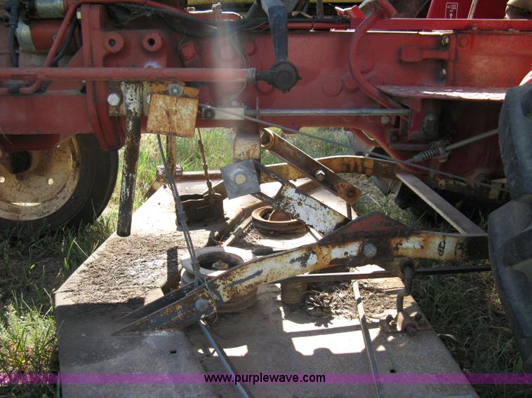 image for item 5065 International 284 tractor with 72" belly mower