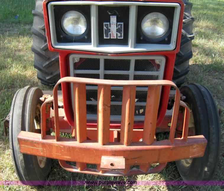 image for item 5065 International 284 tractor with 72" belly mower