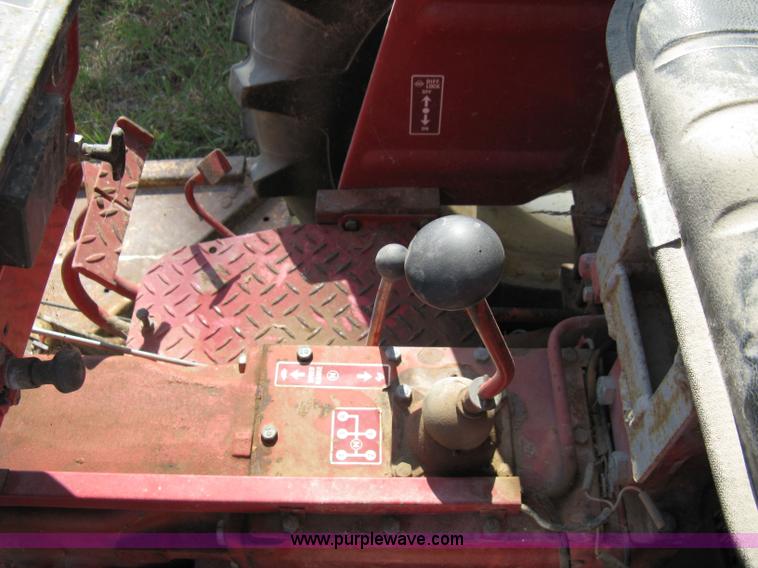 image for item 5065 International 284 tractor with 72" belly mower