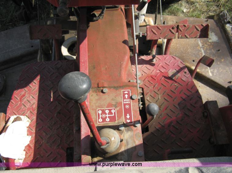 image for item 5065 International 284 tractor with 72" belly mower