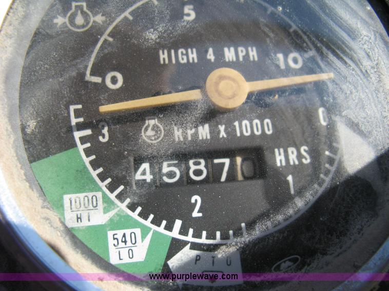 image for item 5065 International 284 tractor with 72" belly mower