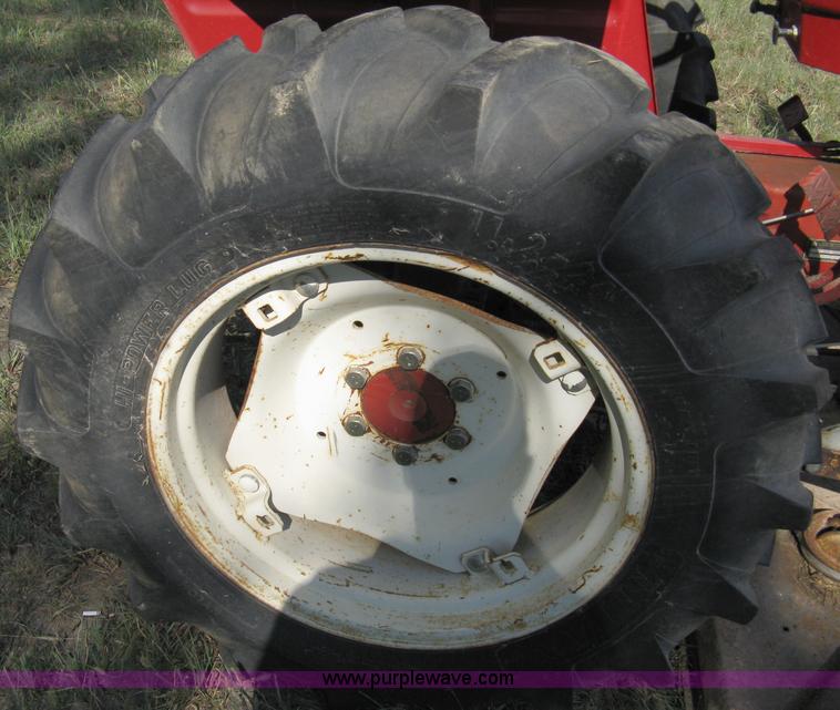image for item 5065 International 284 tractor with 72" belly mower