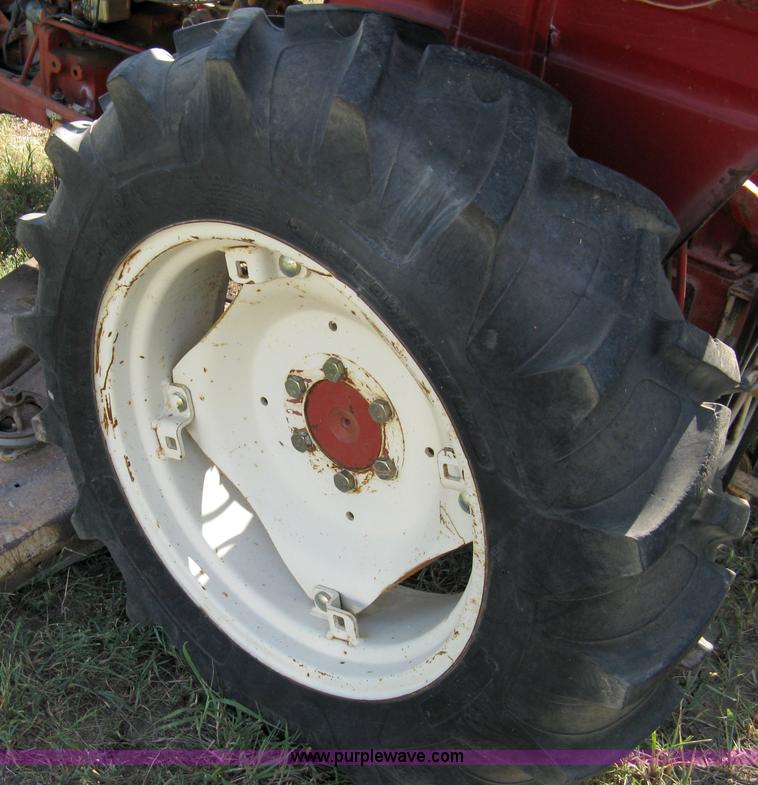 image for item 5065 International 284 tractor with 72" belly mower