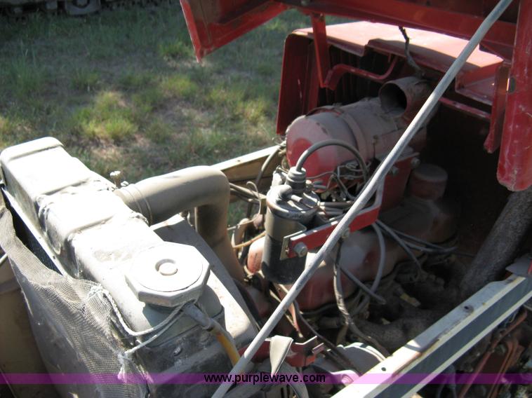 image for item 5065 International 284 tractor with 72" belly mower