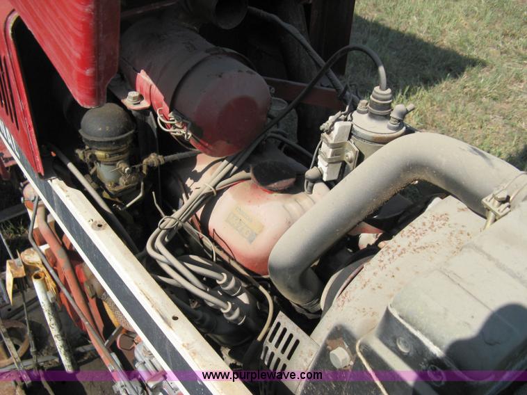 image for item 5065 International 284 tractor with 72" belly mower