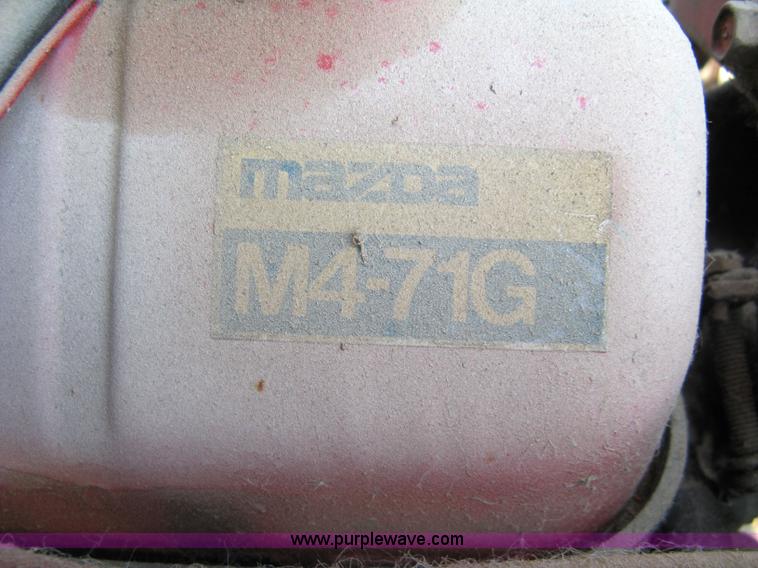 image for item 5065 International 284 tractor with 72" belly mower