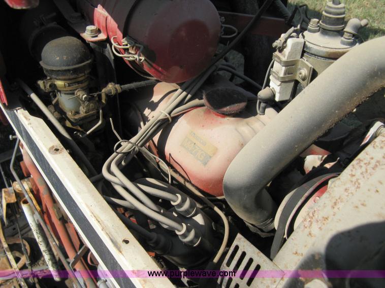 image for item 5065 International 284 tractor with 72" belly mower