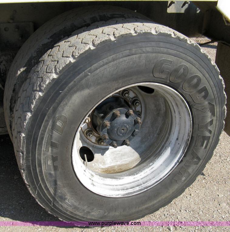 image for item 5068 1999 International Paystar 5000SF mixer truck