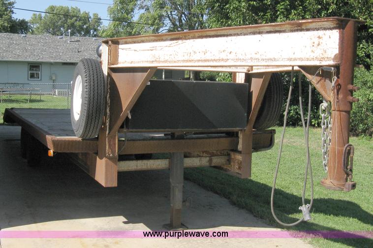 image for item 5103 1977 homebuilt gooseneck, flat-bed, tandem axle trailer