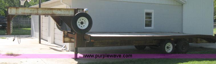 image for item 5103 1977 homebuilt gooseneck, flat-bed, tandem axle trailer
