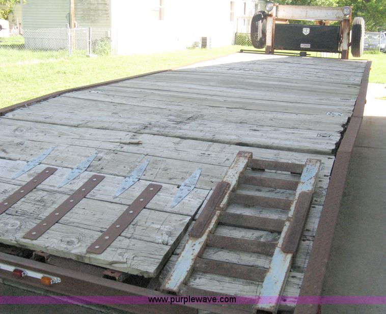 image for item 5103 1977 homebuilt gooseneck, flat-bed, tandem axle trailer