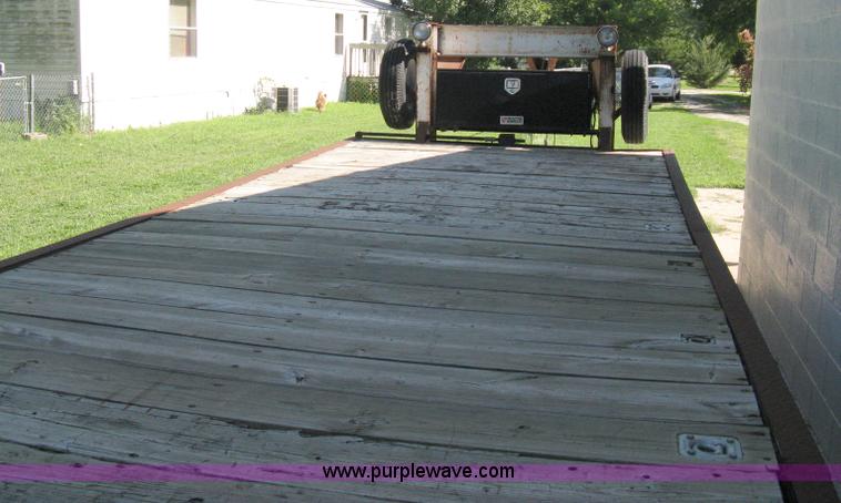 image for item 5103 1977 homebuilt gooseneck, flat-bed, tandem axle trailer