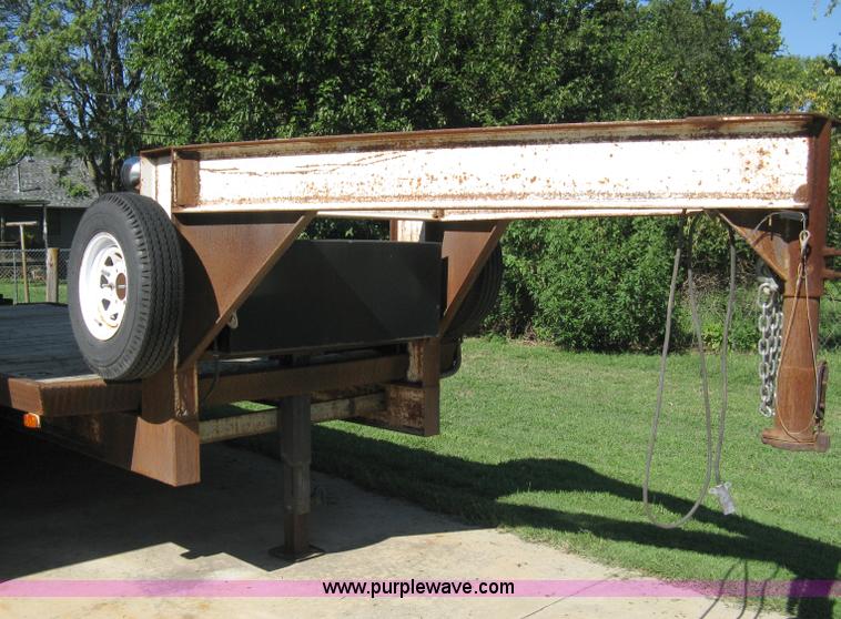image for item 5103 1977 homebuilt gooseneck, flat-bed, tandem axle trailer
