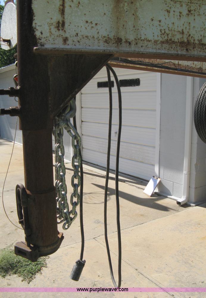 image for item 5103 1977 homebuilt gooseneck, flat-bed, tandem axle trailer