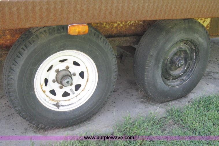 image for item 5103 1977 homebuilt gooseneck, flat-bed, tandem axle trailer