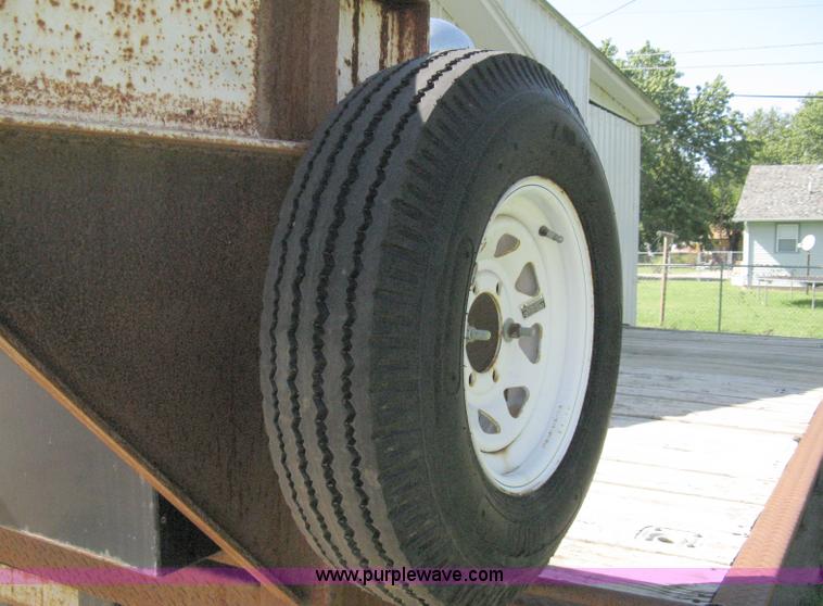 image for item 5103 1977 homebuilt gooseneck, flat-bed, tandem axle trailer