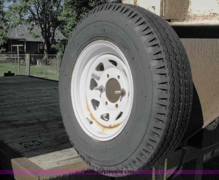 image for item 5103 1977 homebuilt gooseneck, flat-bed, tandem axle trailer