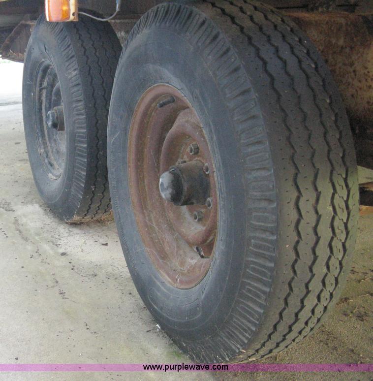 image for item 5103 1977 homebuilt gooseneck, flat-bed, tandem axle trailer