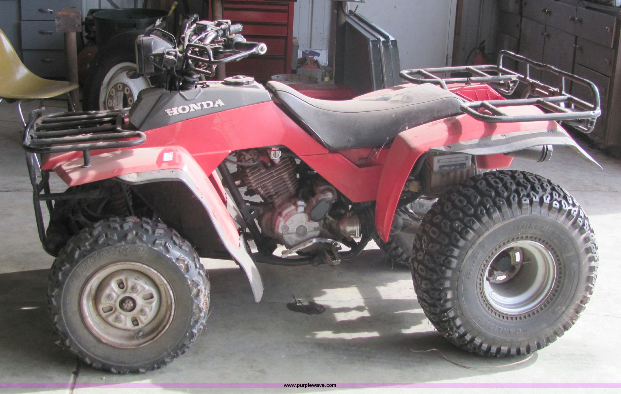 1987 Honda TRX250 ATV in Milton, KS Item 6819 sold Purple Wave