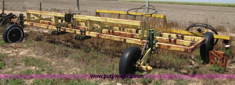 image for item 3428 Roll-a cone 21' triple tool bar with guage wheels