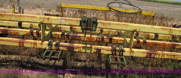 image for item 3428 Roll-a cone 21' triple tool bar with guage wheels