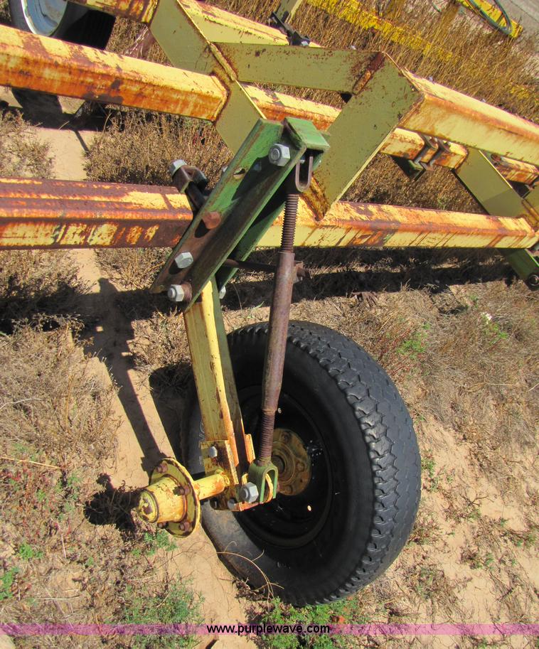 image for item 3428 Roll-a cone 21' triple tool bar with guage wheels