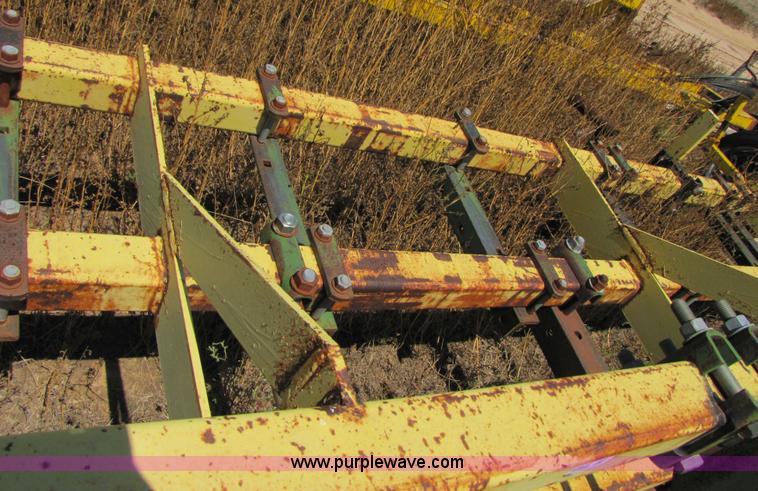 image for item 3428 Roll-a cone 21' triple tool bar with guage wheels