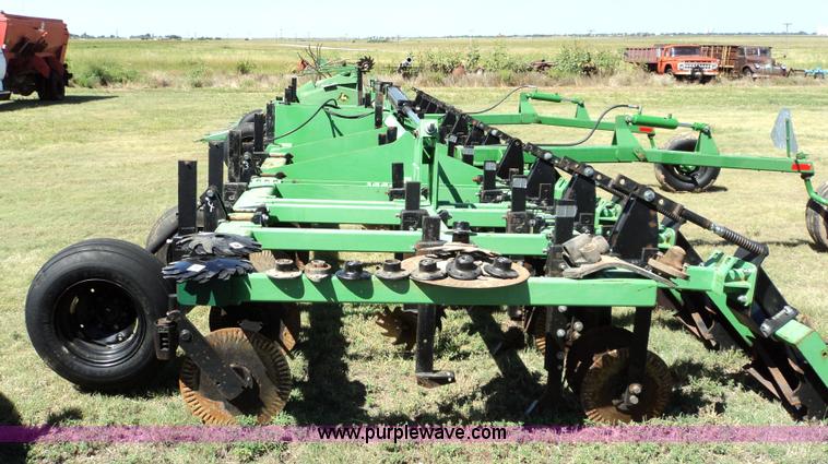 image for item 3436 Bigham Brothers 12-row strip-til plow with rear lift assist wheel assembly