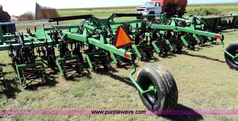 image for item 3436 Bigham Brothers 12-row strip-til plow with rear lift assist wheel assembly