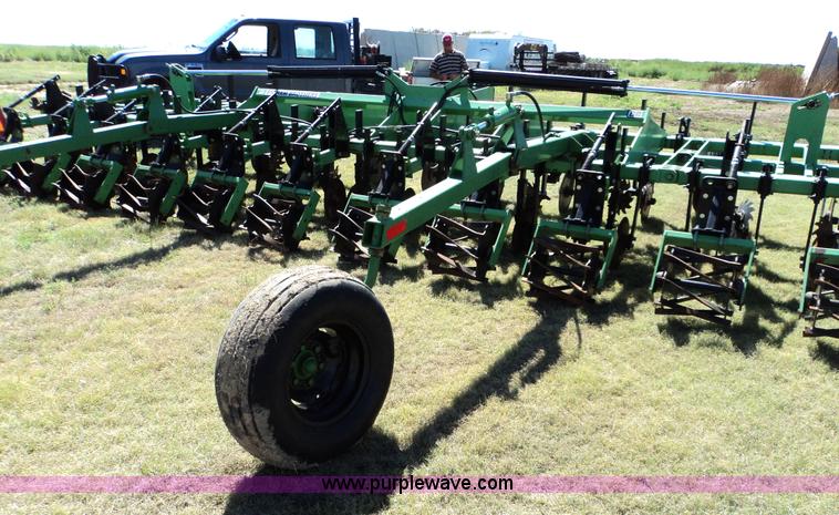 image for item 3436 Bigham Brothers 12-row strip-til plow with rear lift assist wheel assembly