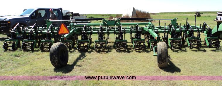 image for item 3436 Bigham Brothers 12-row strip-til plow with rear lift assist wheel assembly