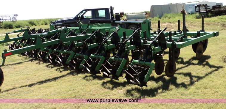 image for item 3436 Bigham Brothers 12-row strip-til plow with rear lift assist wheel assembly