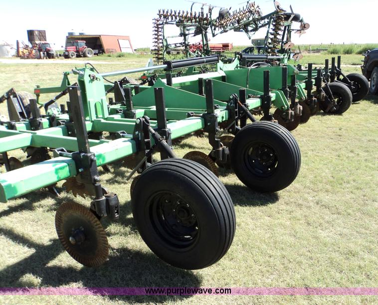 image for item 3436 Bigham Brothers 12-row strip-til plow with rear lift assist wheel assembly