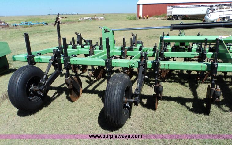image for item 3436 Bigham Brothers 12-row strip-til plow with rear lift assist wheel assembly