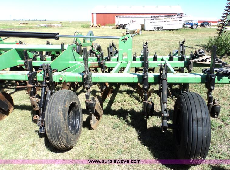 image for item 3436 Bigham Brothers 12-row strip-til plow with rear lift assist wheel assembly