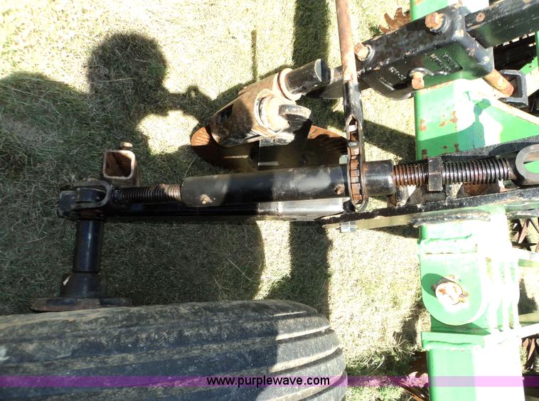 image for item 3436 Bigham Brothers 12-row strip-til plow with rear lift assist wheel assembly