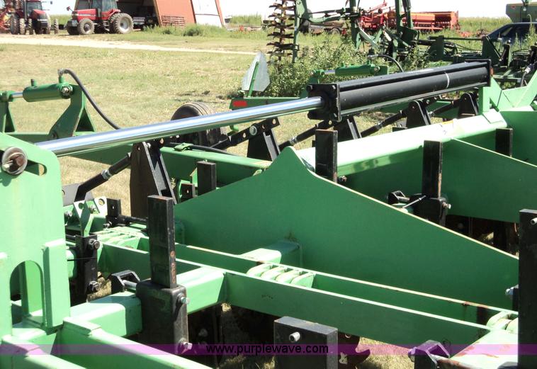 image for item 3436 Bigham Brothers 12-row strip-til plow with rear lift assist wheel assembly