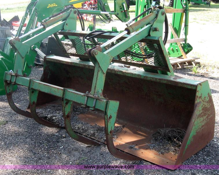 image for item 2635 John Deere 8' bucket with grapple