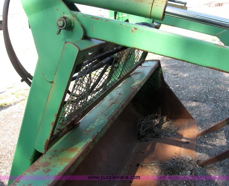 image for item 2635 John Deere 8' bucket with grapple