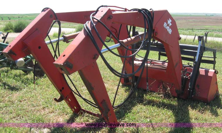 image for item 2659 Massey-Ferguson 848 loader with Dual 94 grapple
