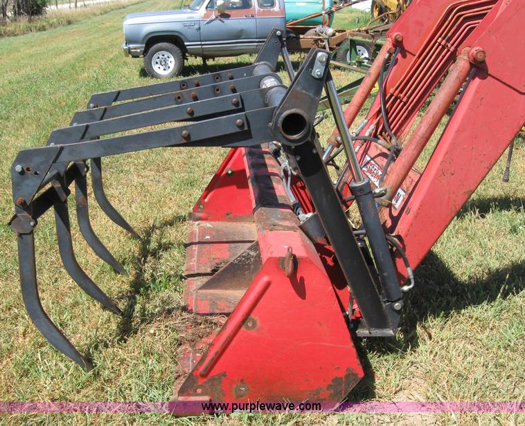 MasseyFerguson 848 loader with Dual 94 grapple in Beloit, KS Item