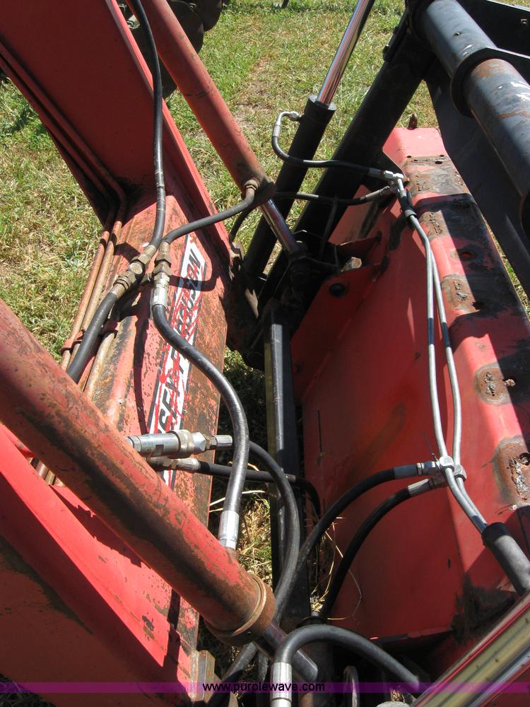 image for item 2659 Massey-Ferguson 848 loader with Dual 94 grapple