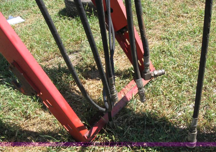 image for item 2659 Massey-Ferguson 848 loader with Dual 94 grapple