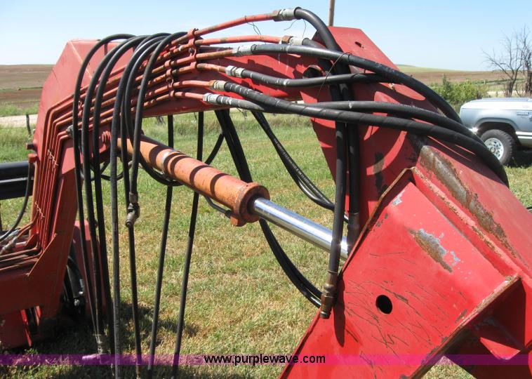 image for item 2659 Massey-Ferguson 848 loader with Dual 94 grapple
