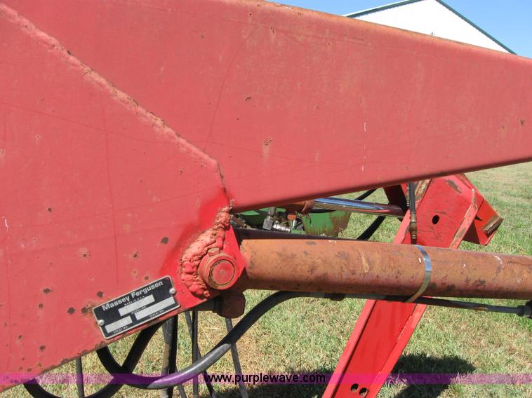 image for item 2659 Massey-Ferguson 848 loader with Dual 94 grapple